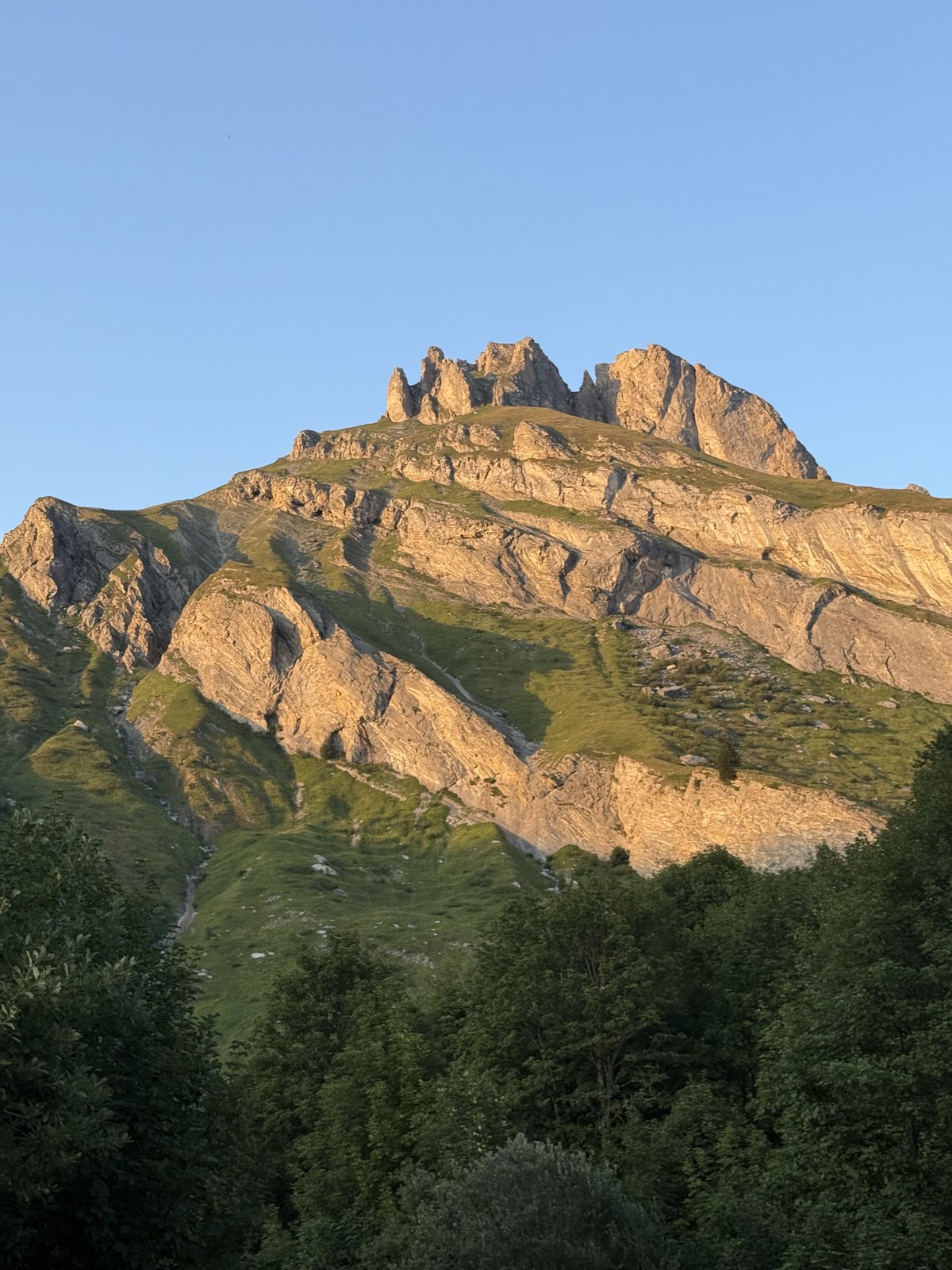 sunset over the peaks at Camping de Domelin